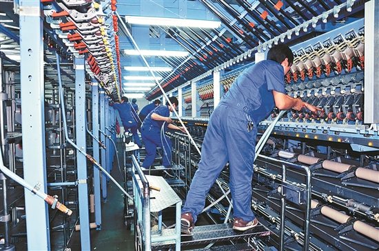 泉州服裝加快“機(jī)器換人”步伐-中國(guó)僑網(wǎng)